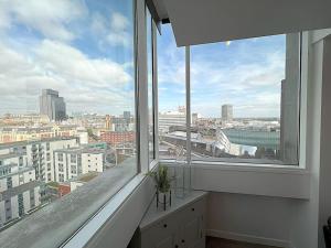 a large window with a view of a city at The Penthouse Of Opulence in Birmingham