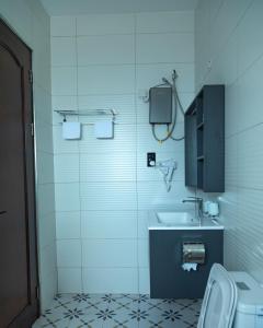 Vannituba majutusasutuses Sumix Hotel