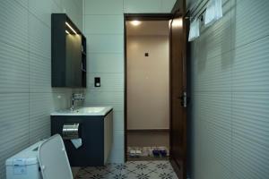 Vannituba majutusasutuses Sumix Hotel