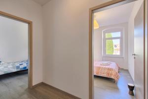 Postel nebo postele na pokoji v ubytování Apartment Spagnolo City