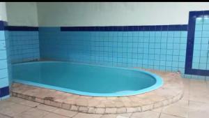 Πισίνα στο ή κοντά στο Quarto EXCLUSIVO para MULHERES em casa mobiliada em Rondonópolis- MT