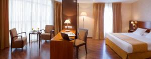 Postel nebo postele na pokoji v ubytování Hotel Torre de Sila