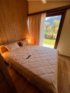 Postel nebo postele na pokoji v ubytování Pirin Golf Villa Relax + 37 fotografií