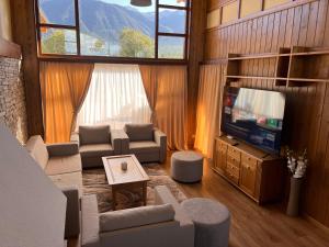 TV a/nebo společenská místnost v ubytování Pirin Golf Villa Relax