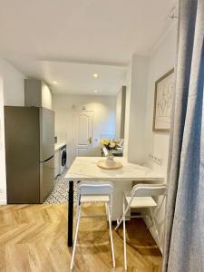 Η κουζίνα ή μικρή κουζίνα στο Appartement Cosy proche de Disney, Paris et Charles de Gaulle +22 φωτογραφίες