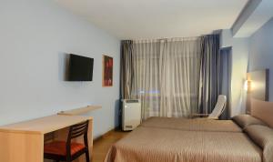 TV a/nebo společenská místnost v ubytování Hotel Faranda Alisas Santander, Ascend Hotel Collection