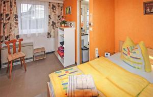 Katil atau katil-katil dalam bilik di Ferienhaus Luckow +2 gambar
