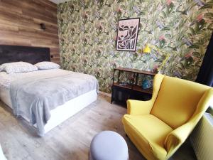 Posteľ alebo postele v izbe v ubytovaní Boho Apartments