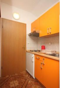 Køkken eller tekøkken på Riva Apartments + 19 billeder