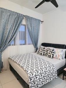 a bedroom with a bed and a window at rumaKL at Majestic Maxim in Kuala Lumpur +22 photos
