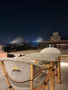 Imagem da galeria de New pyramids way em Cairo