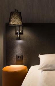 Postel nebo postele na pokoji v ubytování K7 Hotel Oslo
