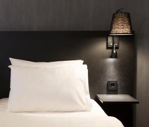 Postel nebo postele na pokoji v ubytování K7 Hotel Oslo