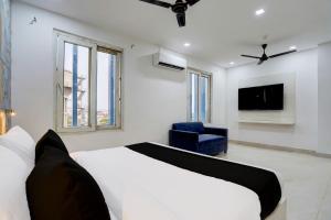 Giường trong phòng chung tại Super Townhouse Status By Sbg Near Anand Vihar Vaishali Metro Station