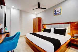 Giường trong phòng chung tại Super Townhouse Status By Sbg Near Anand Vihar Vaishali Metro Station