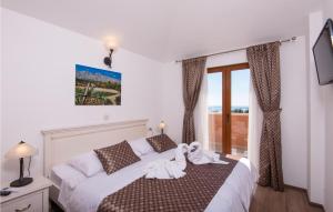 Posteľ alebo postele v izbe v ubytovaní 3 Bedroom Nice Home In Orebic