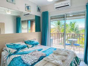 Giường trong phòng chung tại Beach Living - pé na areia, 200m do Beach Park +115 ảnh
