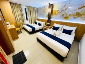 Voodi või voodid majutusasutuse ESSY Hotel KL Sentral toas