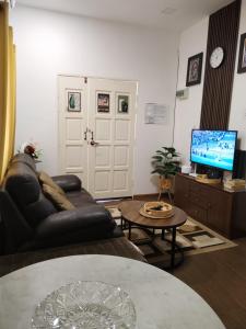 TV a/nebo společenská místnost v ubytování Z&S Gerik Hillview Homestay
