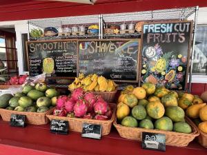 a display of fruits and vegetables in a store at Islander on the Beach 154 in Kapaa
