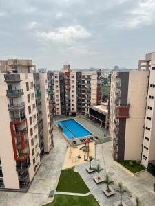 an aerial view of an apartment complex with a swimming pool at 6Floor in society Ecity ph2 Near TCS Tech Mahindra in Bengaluru
