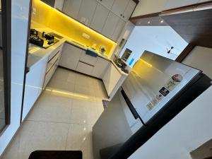an overhead view of a kitchen with yellow ingrediants at 6Floor in society Ecity ph2 Near TCS Tech Mahindra in Bengaluru