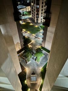 an overhead view of a courtyard in a city at night at 6Floor in society Ecity ph2 Near TCS Tech Mahindra in Bengaluru