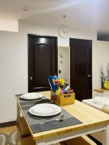 A seating area at Pet-friendly 1BR Condo Unit in Imus with Wifi Netflix -Min 2 nights