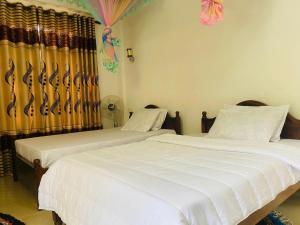 Uma cama ou camas num quarto em The kiwi