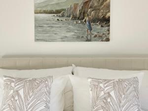 a painting of a woman standing in the water at Montreux Riviera Suite Waterfront 3 Bedrooms Private Parking in Montreux