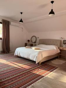 Giường trong phòng chung tại Green Garden Deluxe Villa by Therme