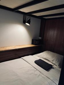 Postel nebo postele na pokoji v ubytování Happiness Hostel