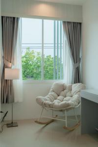 Posezení v ubytování Apo Hotel