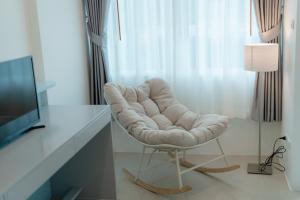 TV a/nebo společenská místnost v ubytování Apo Hotel