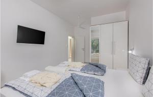 Posteľ alebo postele v izbe v ubytovaní 2 Bedroom Pet Friendly Home In Zestilac