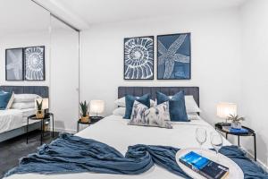 Ένα ή περισσότερα κρεβάτια σε δωμάτιο στο Elwood Beachside Escape