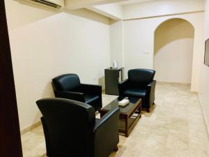 Χώρος καθιστικού στο Al Reef Hotel Suits