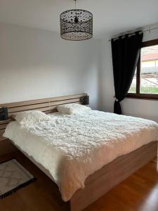 Postel nebo postele na pokoji v ubytování Full Sun Lodge