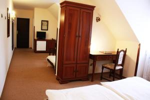 Postel nebo postele na pokoji v ubytování Hotel Excellent