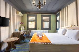 TV a/nebo společenská místnost v ubytování Wonder Wood Hotel