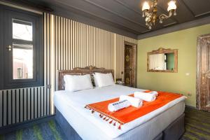 Postel nebo postele na pokoji v ubytování Wonder Wood Hotel