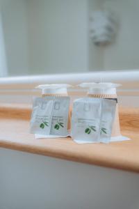 two packages of soap sitting on a shelf at Kyriad Cannes - Mandelieu in Cannes