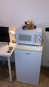 Η κουζίνα ή μικρή κουζίνα στο ViaDante57-Autodromo di Monza, Villa Reale, Università Bicocca, Ospedale San Gerardo +12 φωτογραφίες