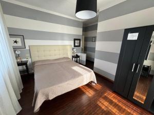 Postel nebo postele na pokoji v ubytování Hotel Le Focette