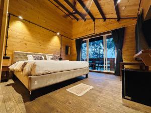 Postel nebo postele na pokoji v ubytování Seclude Eco Cottages