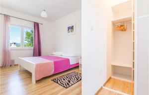 Postel nebo postele na pokoji v ubytování Four-Bedroom Holiday Home In Blato Na Cetini