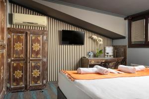 Postel nebo postele na pokoji v ubytování Wonder Wood Hotel