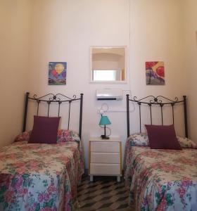 Ένα ή περισσότερα κρεβάτια σε δωμάτιο στο Casa LOREN