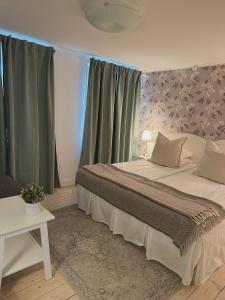Letto o letti in una camera di Smålandsgården