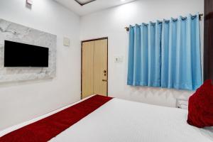 Μια τηλεόραση ή/και κέντρο ψυχαγωγίας στο HOTEL SKY BLUE AND SUITEs